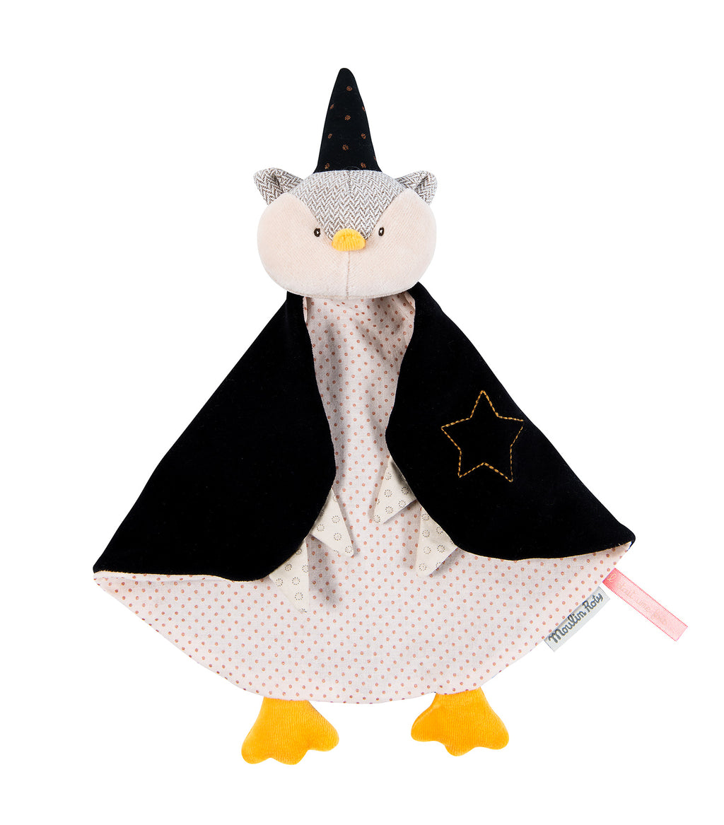 An owl magician in velvet, cotton and tweed, wearing a gold-spotted pointy black hat with his large wings as a cape to wrap around and watch over baby.