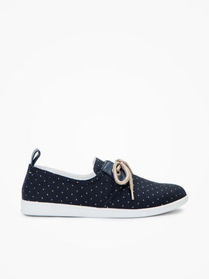 These navy canvas urban sneakers come with gold topstitching polka dots, oversized eyelets and golden shoelace for a stylish look, and light rubber sole for comfort.