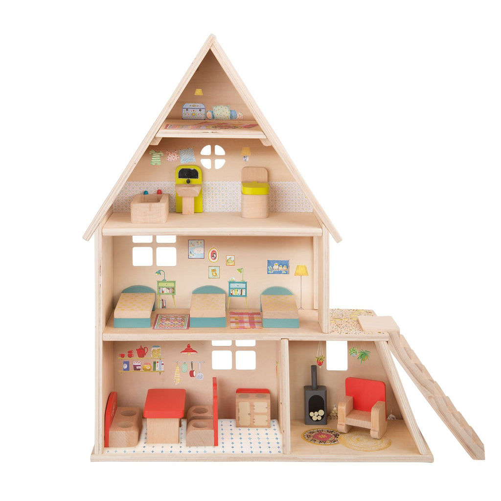 In the style of aFrench country house, this doll's house includes a kitchen, dormitory bedroom, bathroom, conservatory and a loft for hide and seek, plus all its furniture.  