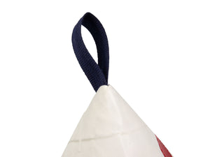 Made of white and red Dacron sail and navy canvas, and adorned with an oversized red number '4', this pyramid-shaped door stopper will add a splash of colour and nautical character to your interior!
